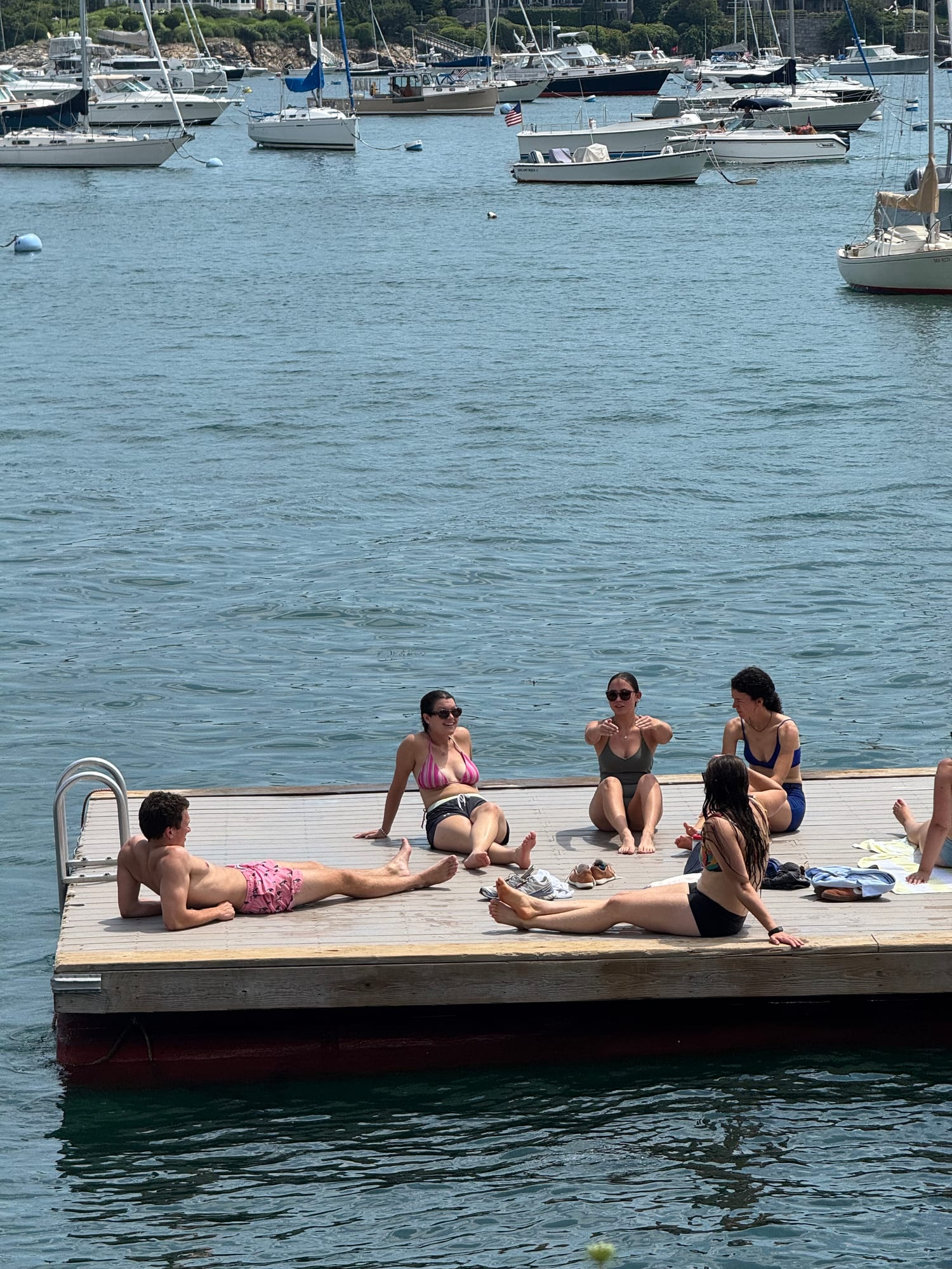 Kids jumping into the water, caught mid-air